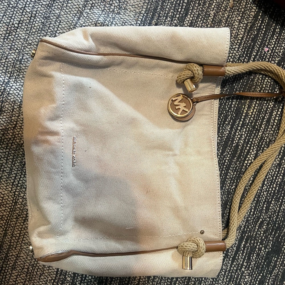 Michael Kors Cream Tote Bag with Gold Charm and Soft Texture